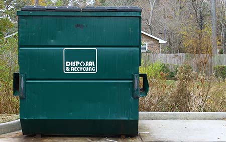 Dumpster pad cleaning